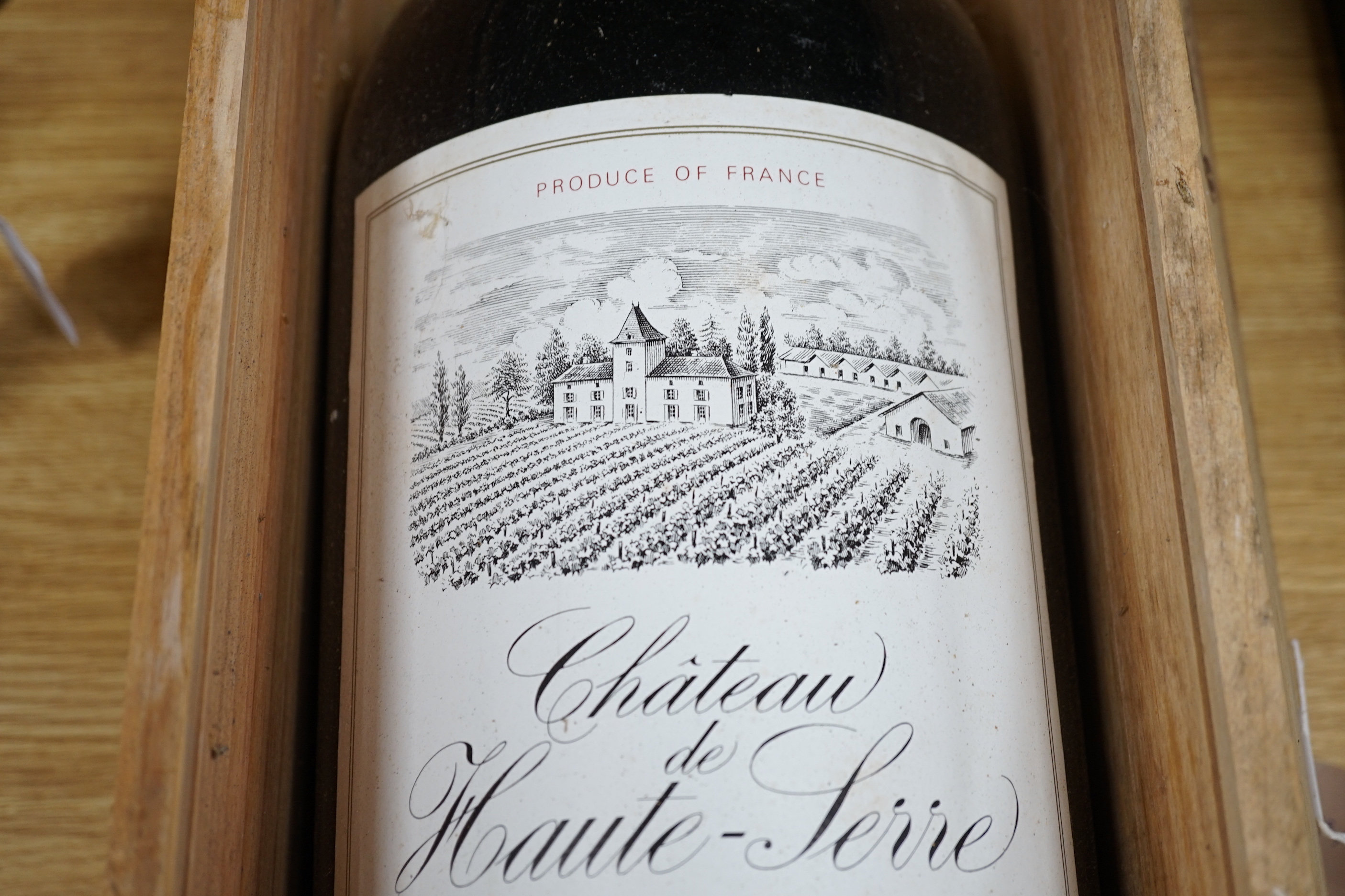 A 1982 Cahors Chateau de Haute-Serre, 6 litre bottle of red wine, in case, 52.5cm